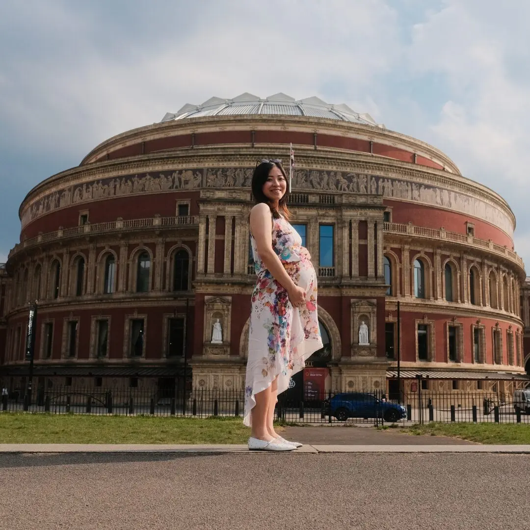 pregnant women smiling during FOF Bike Tours’ romantic e-bike ride through Albert memorial.