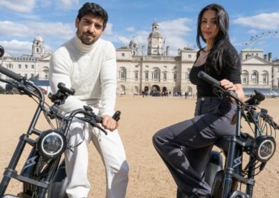 Two guests enjoying their London Bike tours in front of Horse Guard Parade