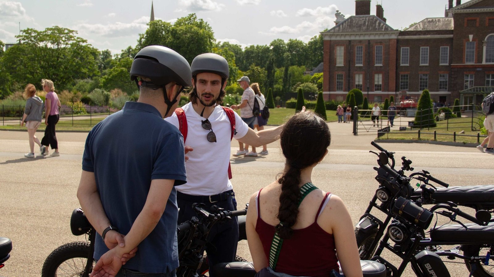 FOF Bike Tours Guide explaining the history of Kensington Palace