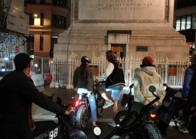 Guests gathered with their e-bikes during a guided stop on the Dickens Christmas London tour.