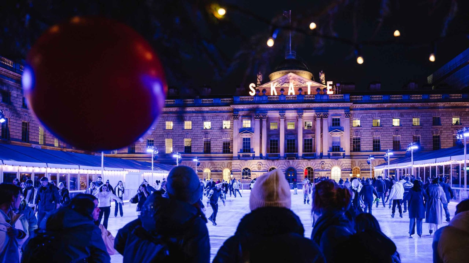Somerset House illuminated for Christmas during the Dickens Christmas London e-bike tour.